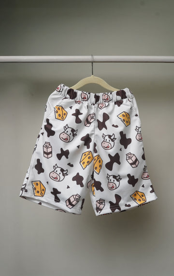 Shorts from Moo Baby Kids Co-Ords Set displayed separately with matching cow print and elastic waistband