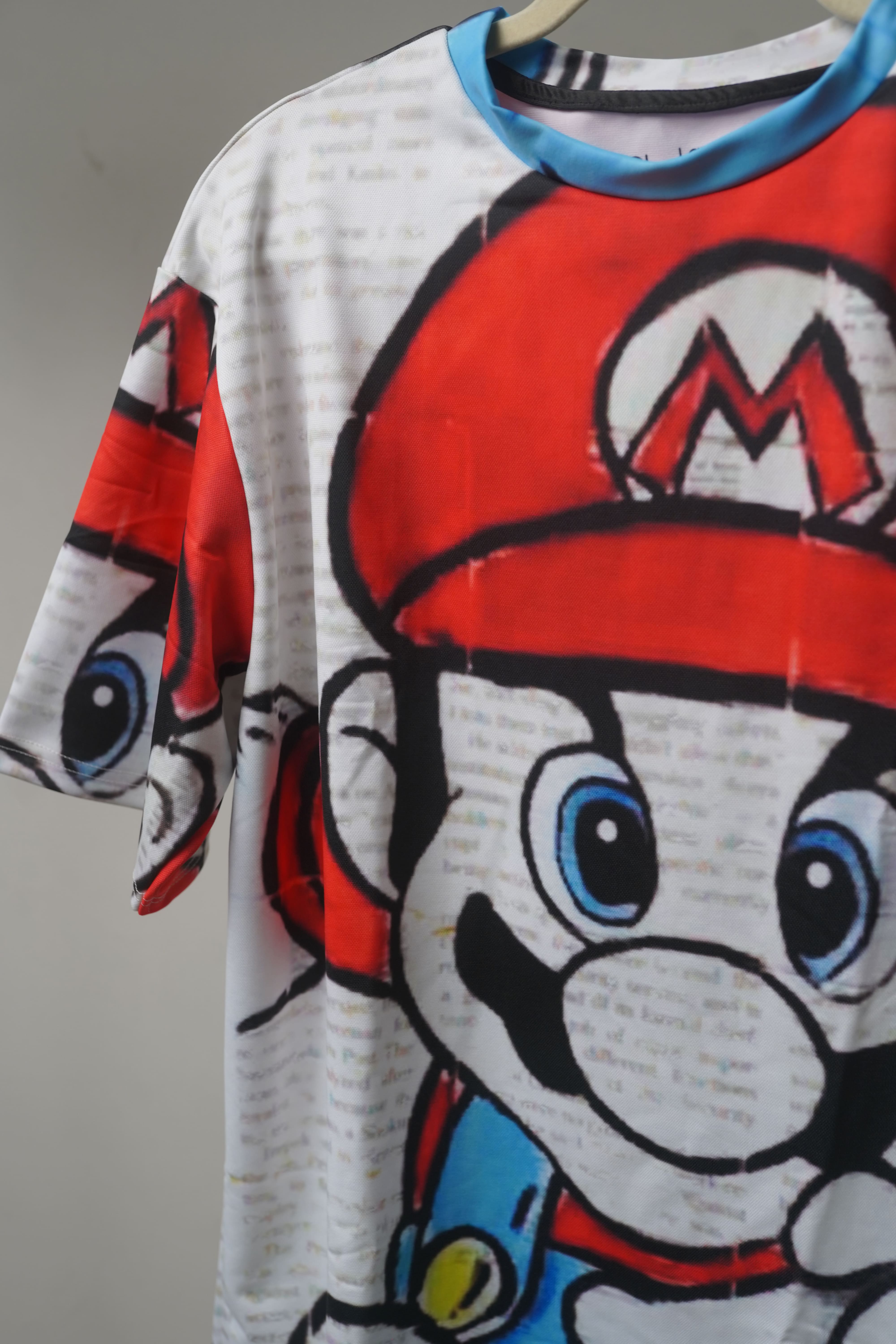 Super Mario Unisex Oversized T-Shirt From The Edi Archive showing the close up details