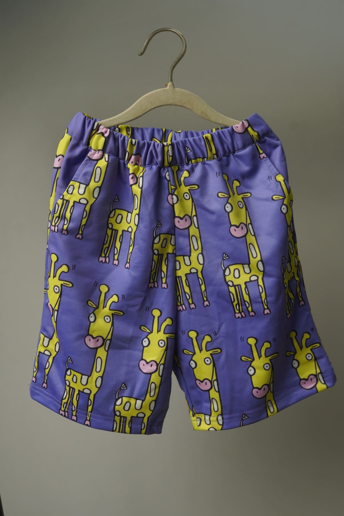 Shorts from Happy Giraffe Kids Co-Ords Set displayed separately with giraffe-themed print and elastic waist