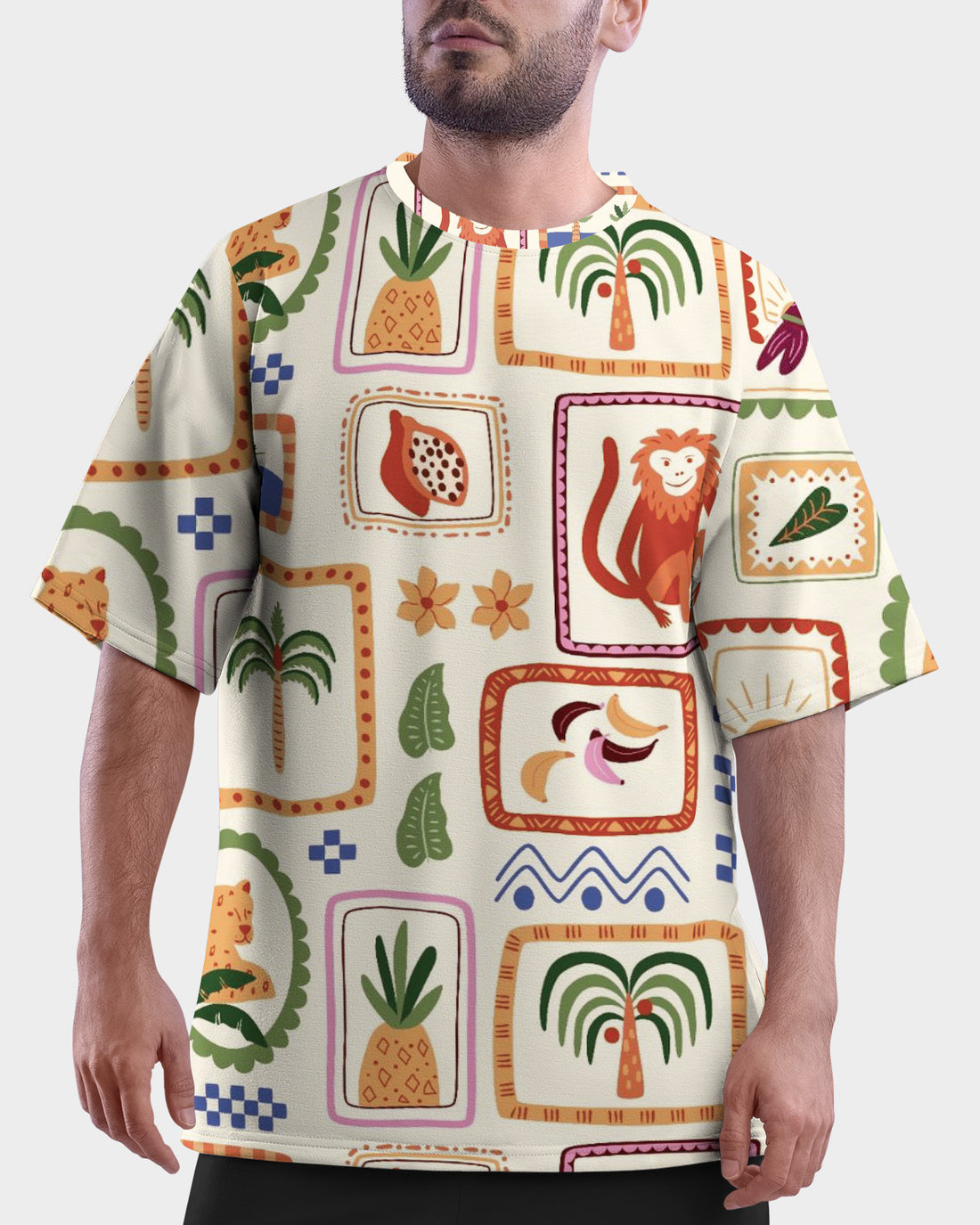 Man holding a coconut wearing a patterned shirt Flora and Fauna Unisex Oversized T-Shirt from The Edi Archive, with a blurred background