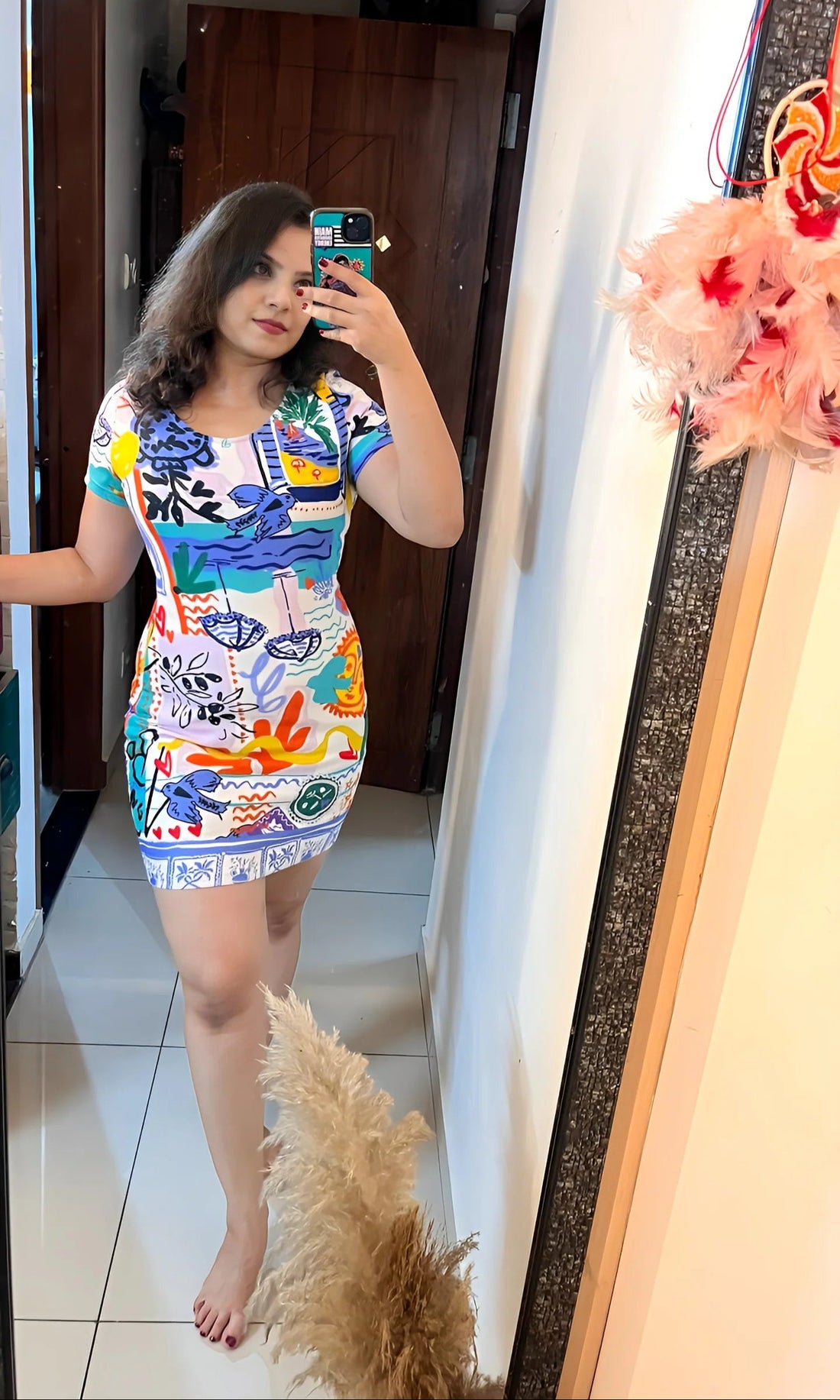 Woman wearing the Slip Away Bodycon Mini Slip Dress from The Edi Archive – fitted tropical slip in soft stretch fabric, styled for a sun-soaked mood.