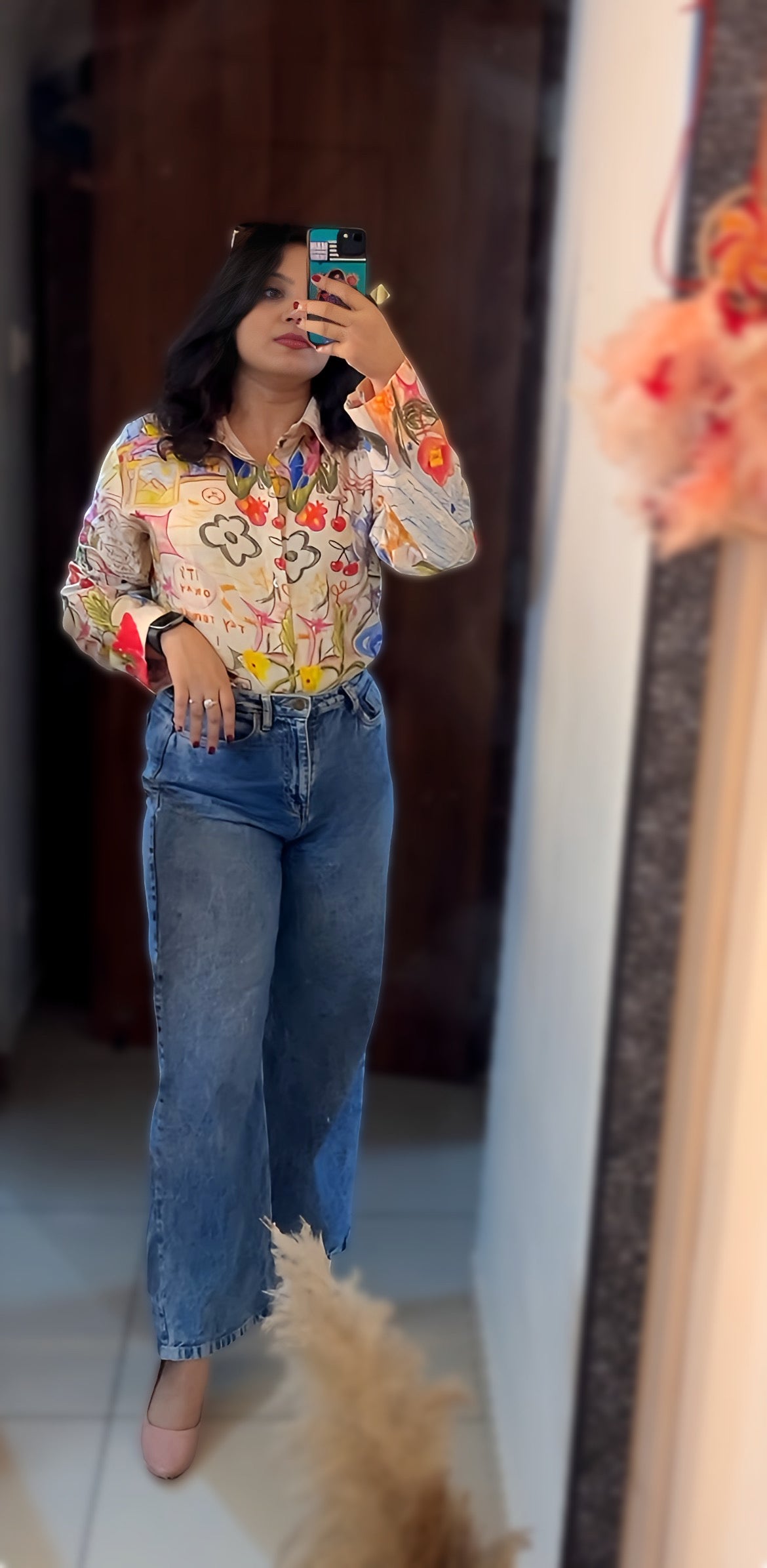 A woman wearing the 'It’s Ok' oversized shirt by The Edi Archive — relaxed poly linen fit, styled effortlessly from the Tropical Drop collection.