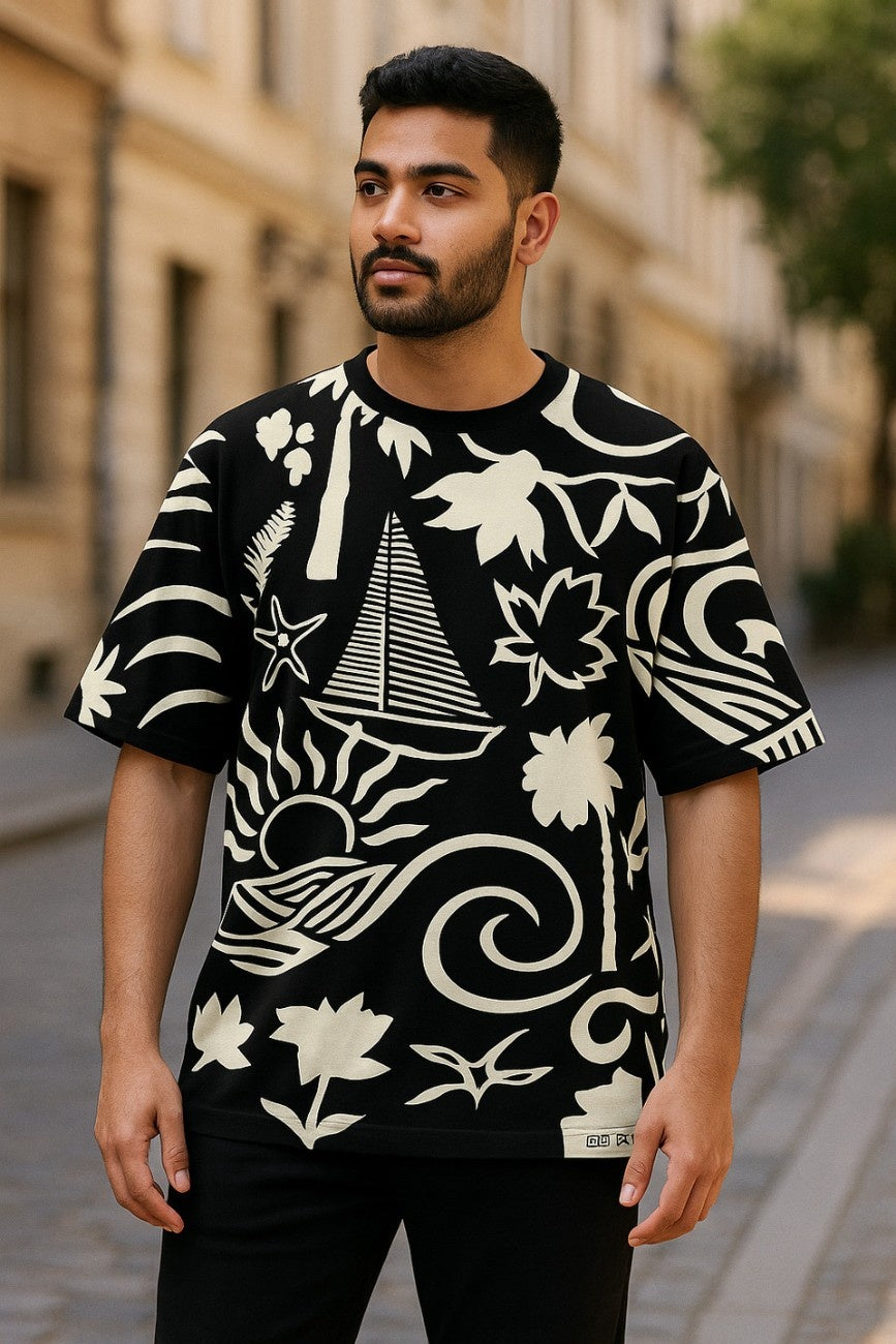 Man wearing a black oversized t-shirt, Sail Away from The Edi Archive walking on a street.