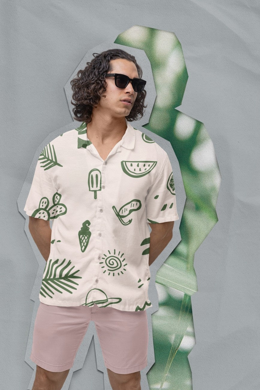 Man wearing a Summer Vacation Hawaiian Shirt from Tropical Drops from The Edi Archive, and shorts with tropical leaves on a beige background