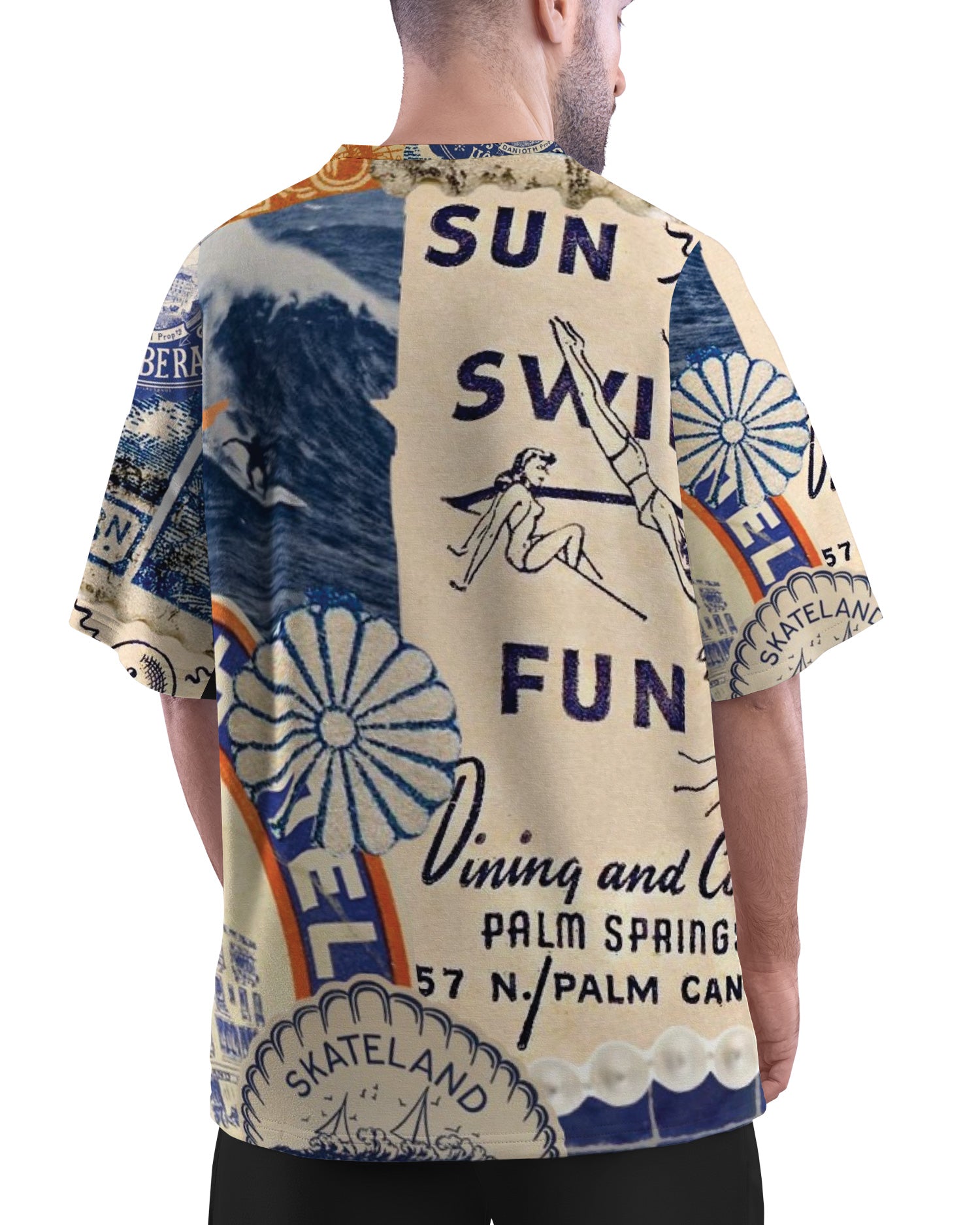 Sun Swim Fun Unisex Oversized T-Shirt from The Edi Archive, with bright tropical-themed all-over print in lightweight drifit fabric as seen on a man back view