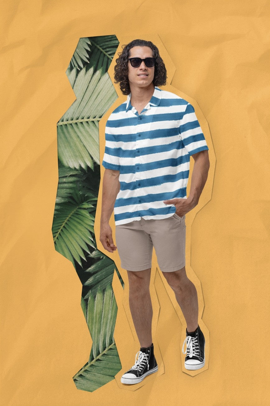 Person wearing a 'Stripe the Turquoise Men's Hawaiian Shirt' from Tropical Drops Collection from The Edi Archive holding a fishbowl.