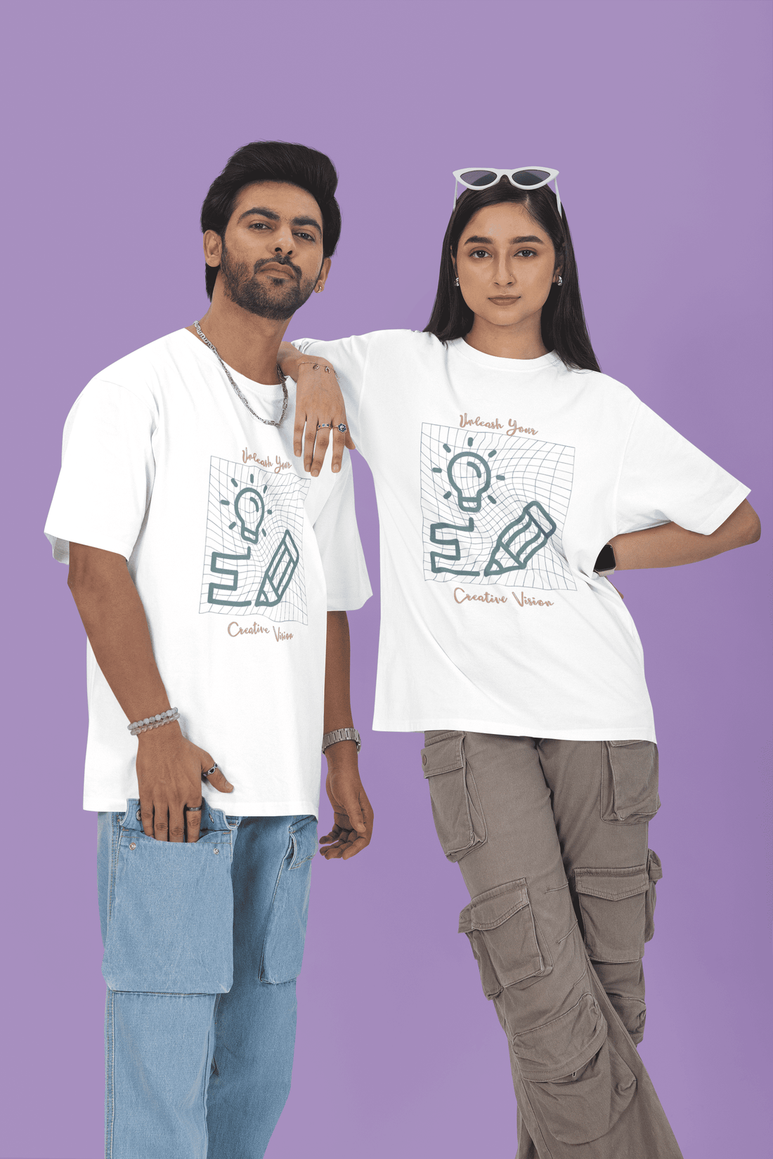 Two people wearing matching off-white t-shirts with your custom graphic designs by The Edi Archive