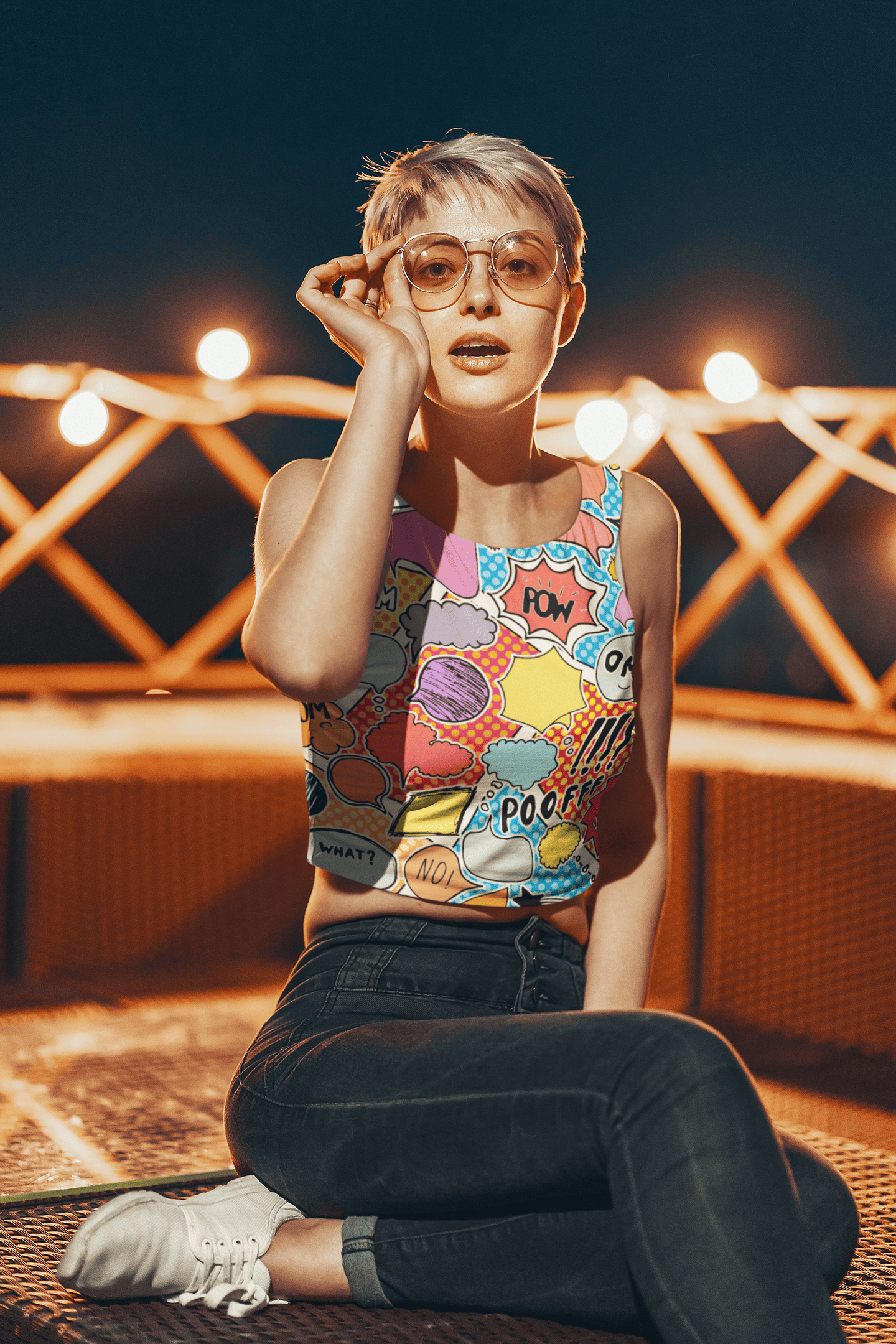 A woman wearing the Poof yellow crop tank top from The Edi Archive’s Ctrl+Me Collection – playful, bold, and cartoon-core cute.