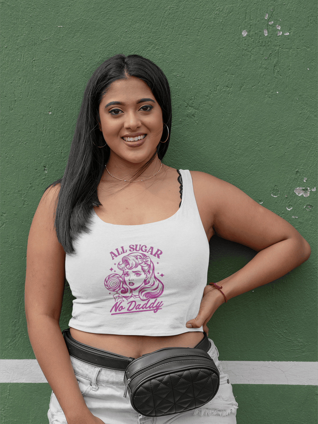 Girl wearing white cotton crop tank top with “All Sugar No Daddy” text from The Edi Archive, styled in playful, confident, self-made energy.
