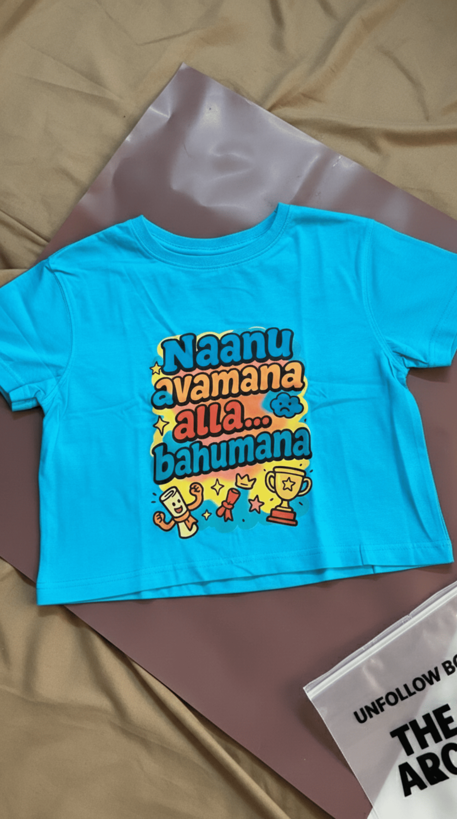 Blue t-shirt with "Naanu Avamana Alla" viral Rakshitha Shetty Dialogue T-Shirt from bigg boss from The Vault collection of The Edi Archive.