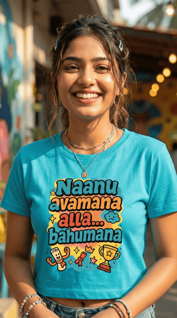 Person wearing a blue t-shirt with Naanu Avaman Alla Viral T-Shirt from The Vault collection of The Edi Archive, close up view.