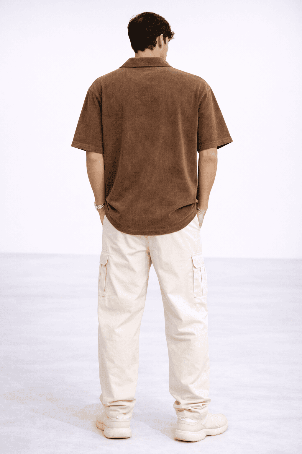 Model wearing the Rustic Roots Zipper Polo in Color Vintage Brown from The Edi Archive's Ctrl+Me Collection - Back view