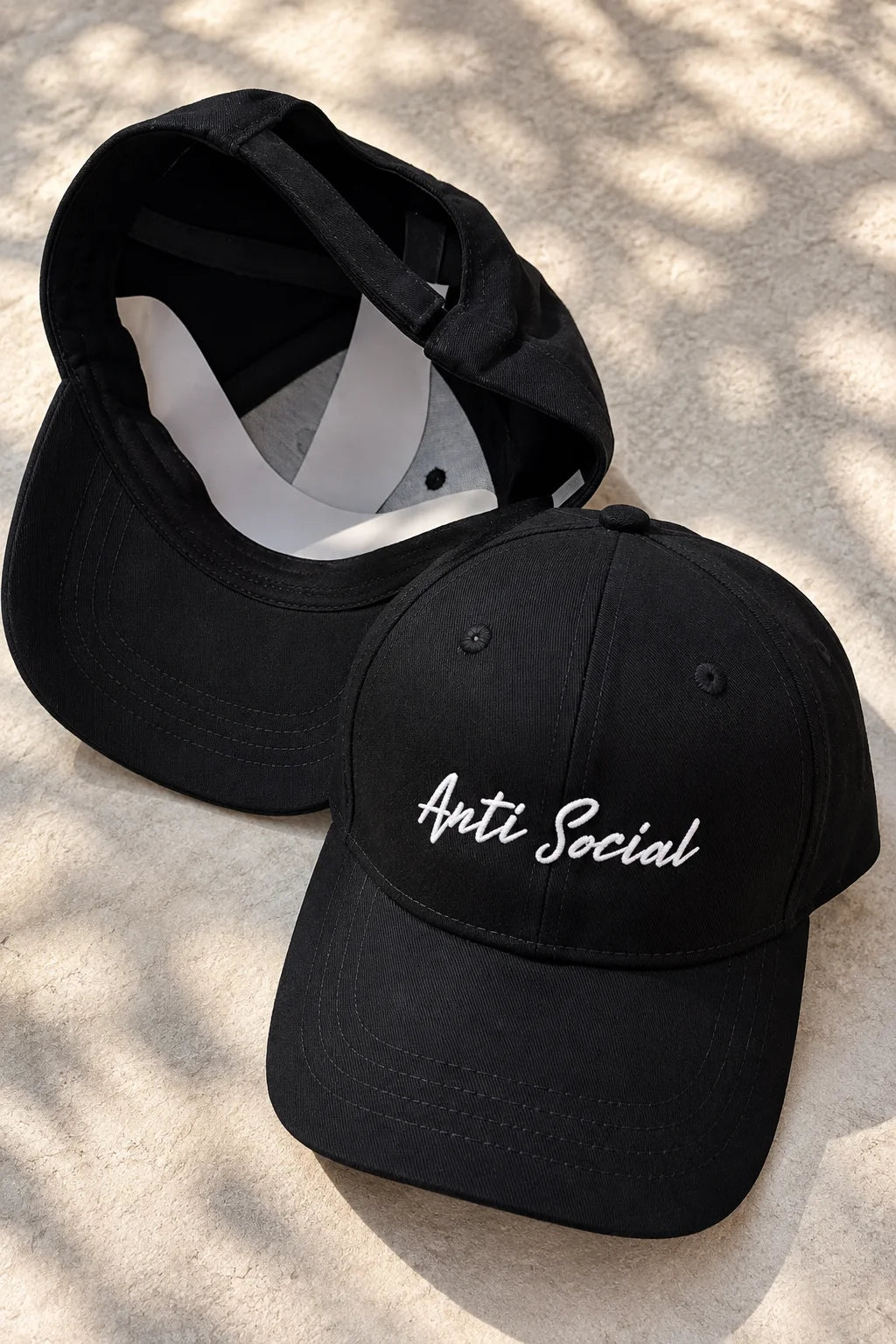 Anti Social Unisex Baseball Cap by The Edi Archive, The Side Quest Collection, black baseball cap shown from front and back