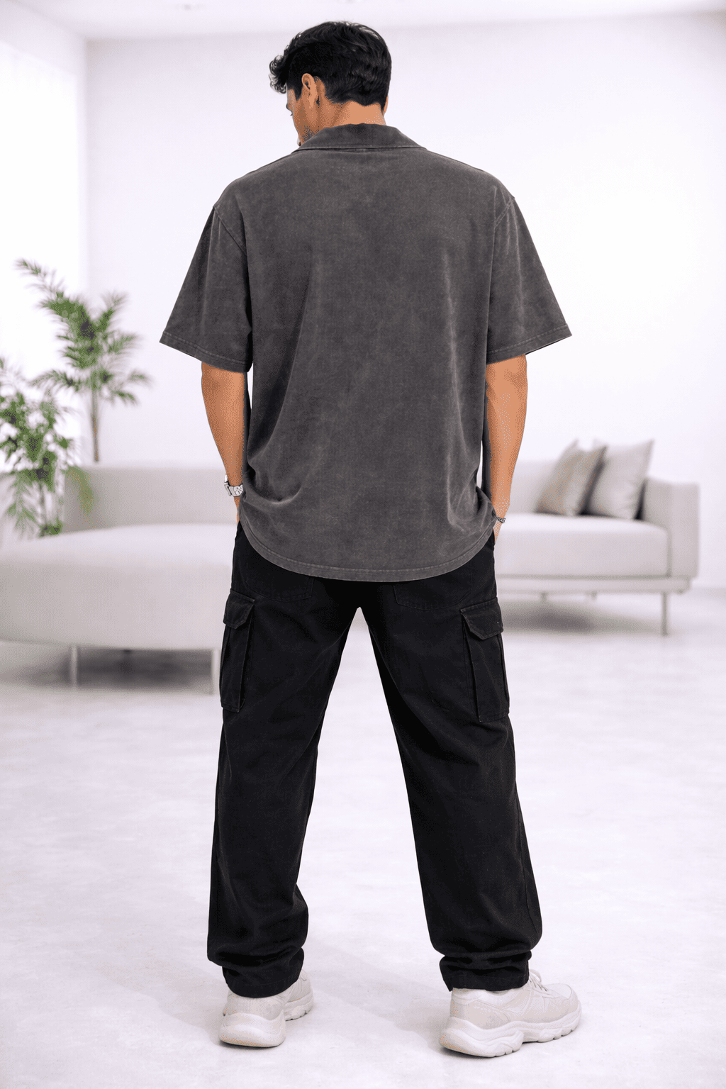 Model wearing the Rustic Roots Zipper Polo in Color Grey from The Edi Archive's Ctrl+Me Collection - Back view