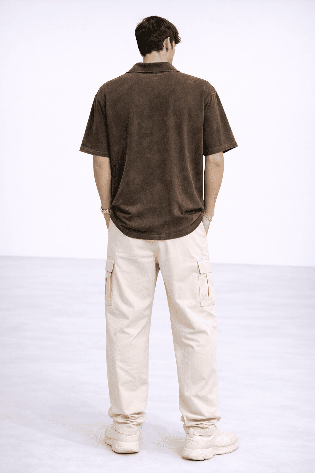 Model wearing the Rustic Roots Zipper Polo in Color Vintage Brown from The Edi Archive's Ctrl+Me Collection - Back view