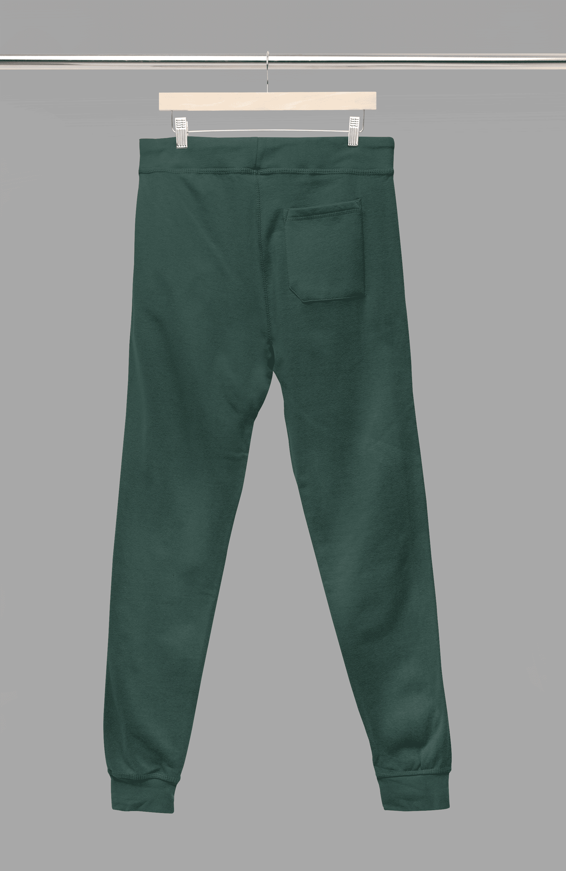 Green joggers close-up back view