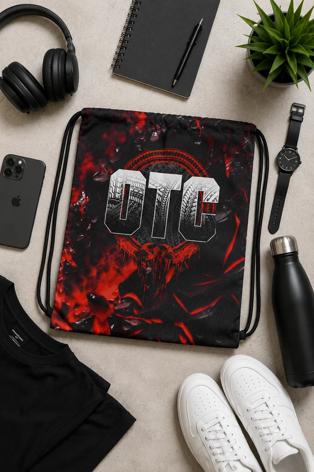 Flat lay of the Custom Canvas Drawstring Bag for Laptop, Gym & Everyday Carry surrounded by everyday essentials from the Custom Archive Collection by The Edi Archive.