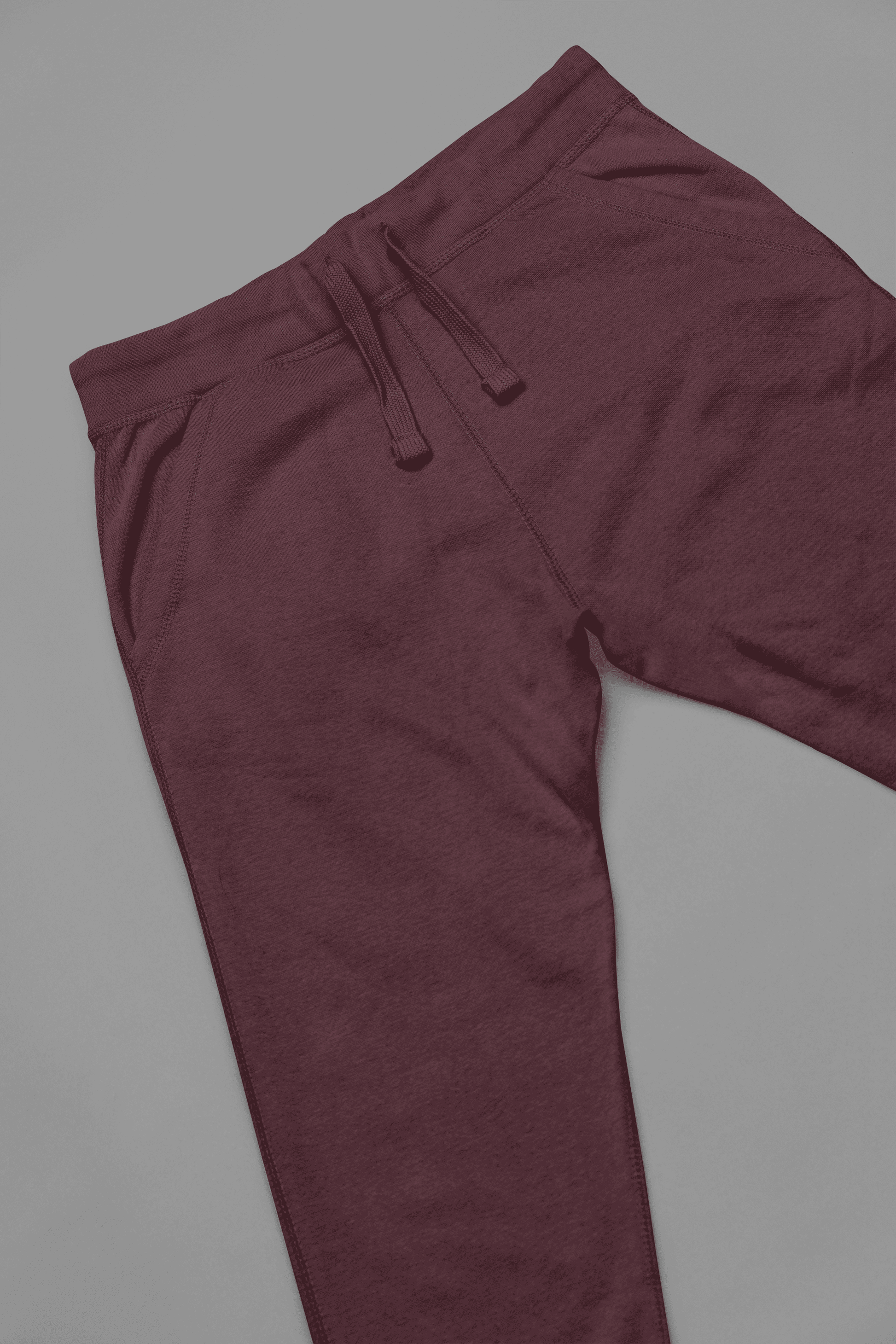 Maroon joggers close-up view