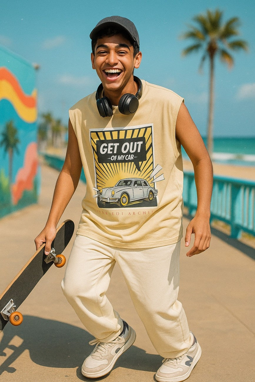 Get Out Of My Car Unisex Oversized Graphic Tank Top Off White worn with oversized track pants headphones and skateboard beachside streetwear outfit The Edi Archive CTRL+Me