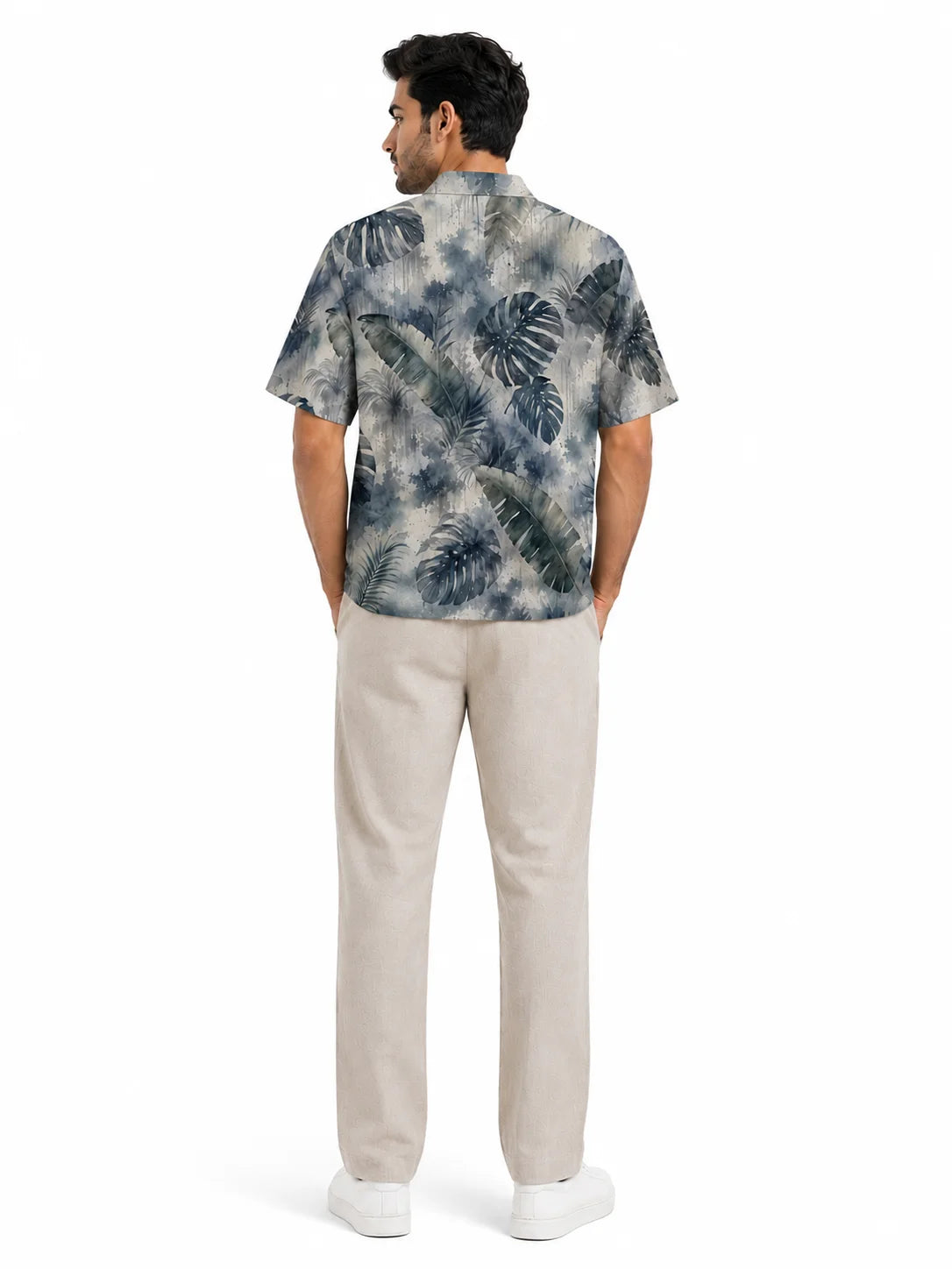 Petrichor men's Cuban collar half sleeve printed shirt, back view showing all-over watercolour palm and monstera artwork, The Tropical Drop collection by The Edi Archive