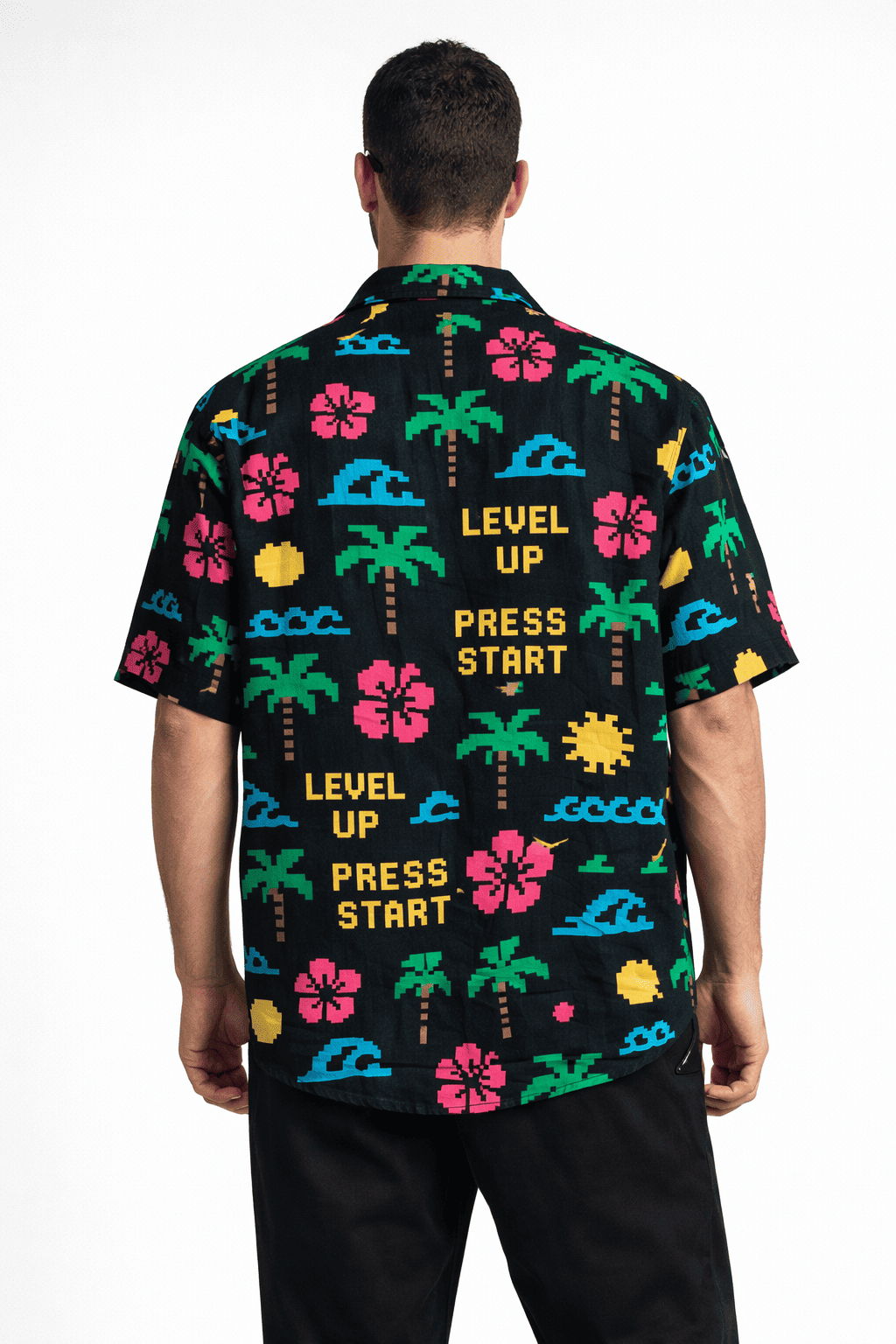 Model wearing Pixel Paradise Men's Hawaiian Oversized Shirt from The Edi Archive's Loudmouth Collection