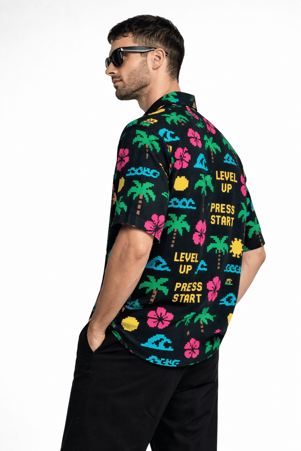 Model wearing Pixel Paradise Men's Hawaiian Oversized Shirt from The Edi Archive's Loudmouth Collection - Left Sleeve Detail