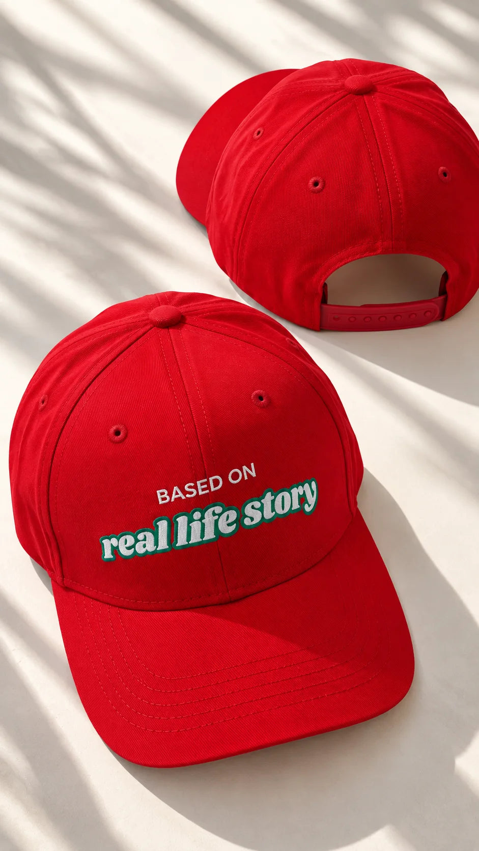 Real Life Story Unisex Snapback Cap by The Edi Archive, The Side Quest Collection, red cotton snapback cap shown from front and back