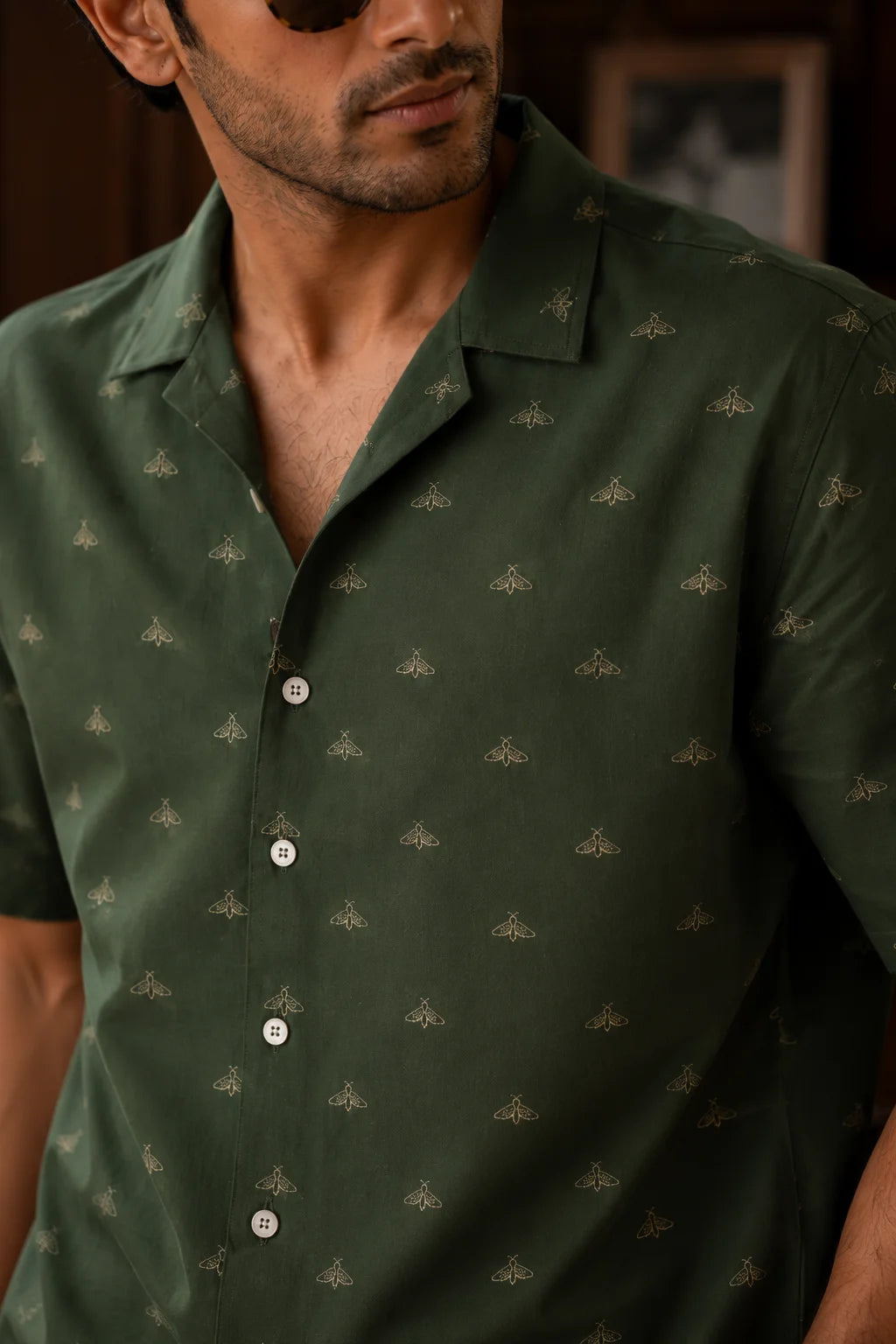 Close-up of Velvet Moth Regular Fit Hawaiian Shirt by The Edi Archive from The Soft Launch Collection featuring premium linen blend fabric and subtle hand-drawn moth print on deep forest green