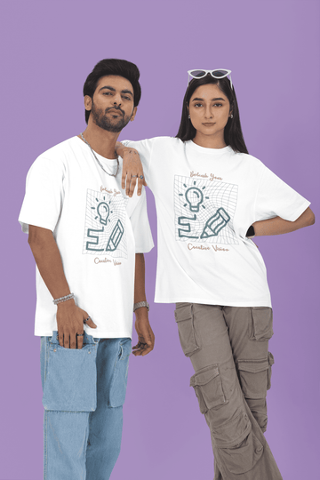 Two people wearing matching White t-shirts with your custom graphic designs by The Edi Archive